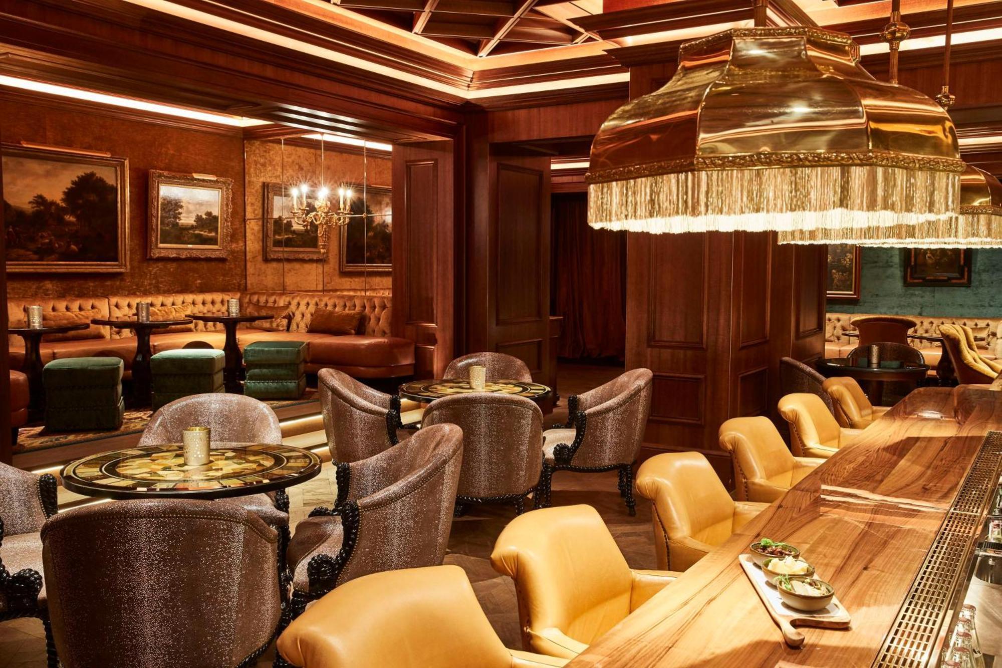 Vier Jahreszeiten Kempinski Muenchen Kültér fotó The interior of the bar