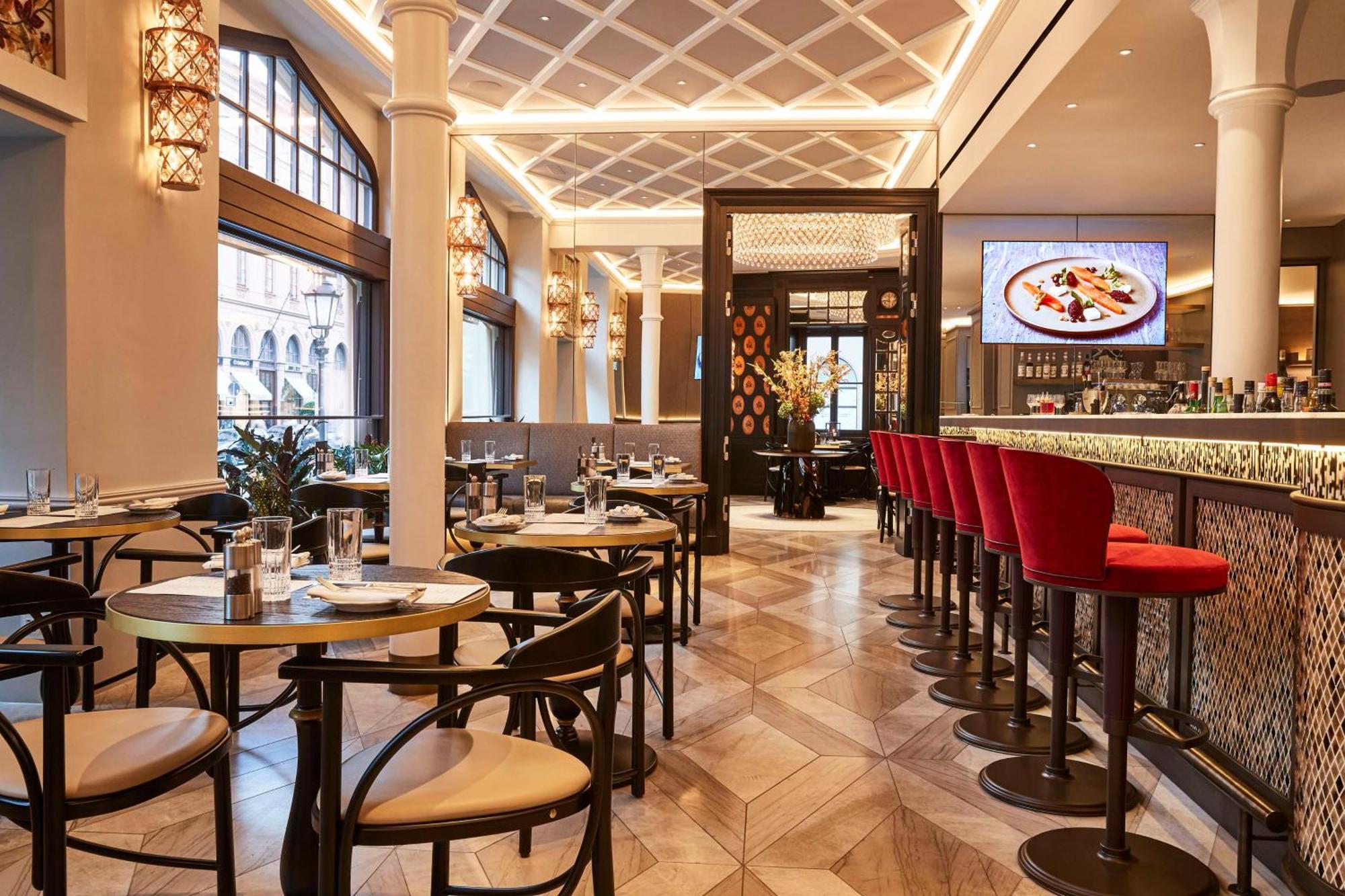 Vier Jahreszeiten Kempinski Muenchen Kültér fotó Interior of the restaurant